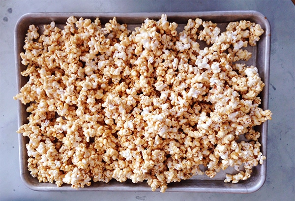 This 5-minute Caramel Corn is a quick and easy snack to make for the kids or for a movie night! Throw in some peanuts and you have homemake Cracker Jack!