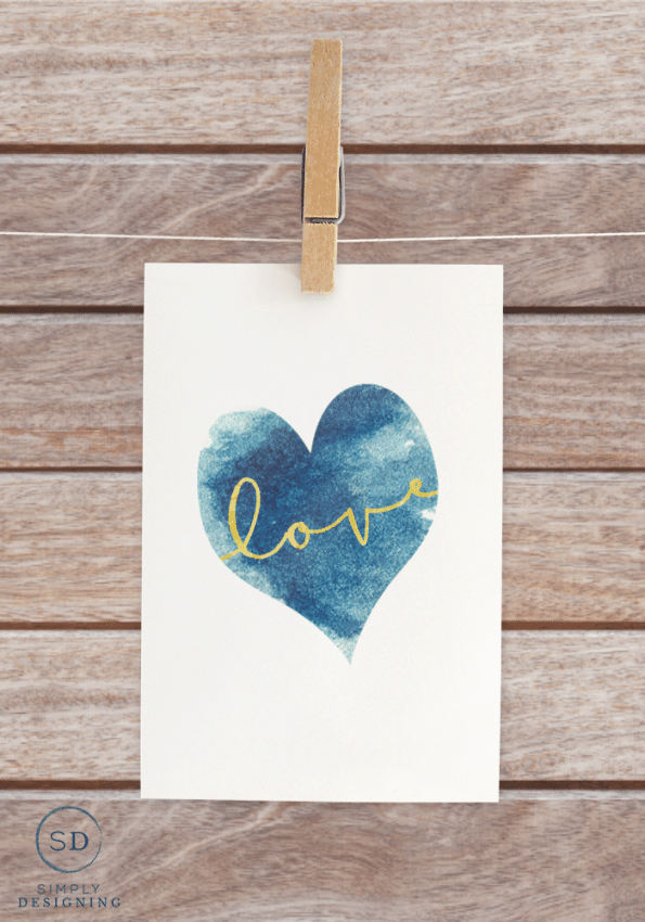 You can grab one of these cute Free Printable Love Signs to use to help decorate your home this Valentine's Day!