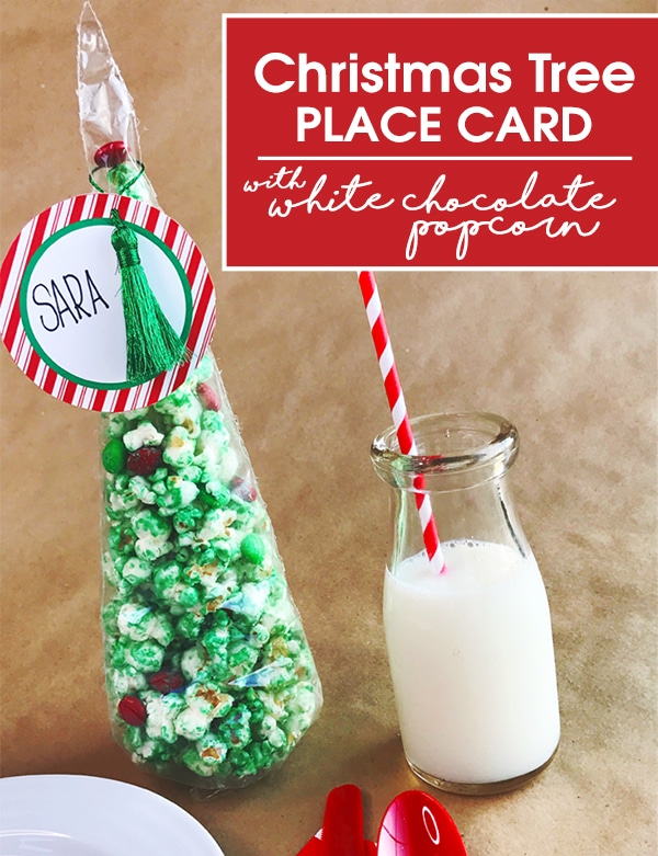 This free printable Christmas Tree Place Card with white chocolate popcorn is super easy to make. Kids will love how the "kid's table" is decorated!