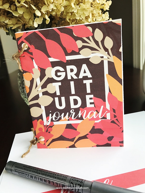 Create this easy DIY Gratitude Journal free printable for your family gathering around the Thanksgiving table or any time of the year.
