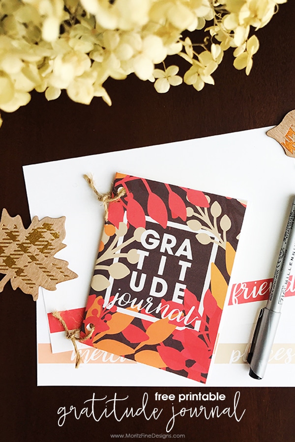 A perfect addition to your Thanksgiving table would be to add this free printable DIY Gratitude Journal to each and every place setting. Let your kids, friends and family write down what they have been thankful for this year. #gratitude #gratitudejournal #thanksgiving #thankfulnessjournal