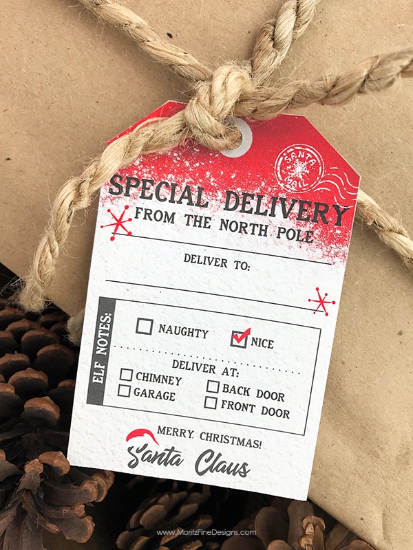 Add this free printable Santa gift tag to your kid's gift from Santa! The customizable tag shows the Christmas gift got delivered from the North Pole.